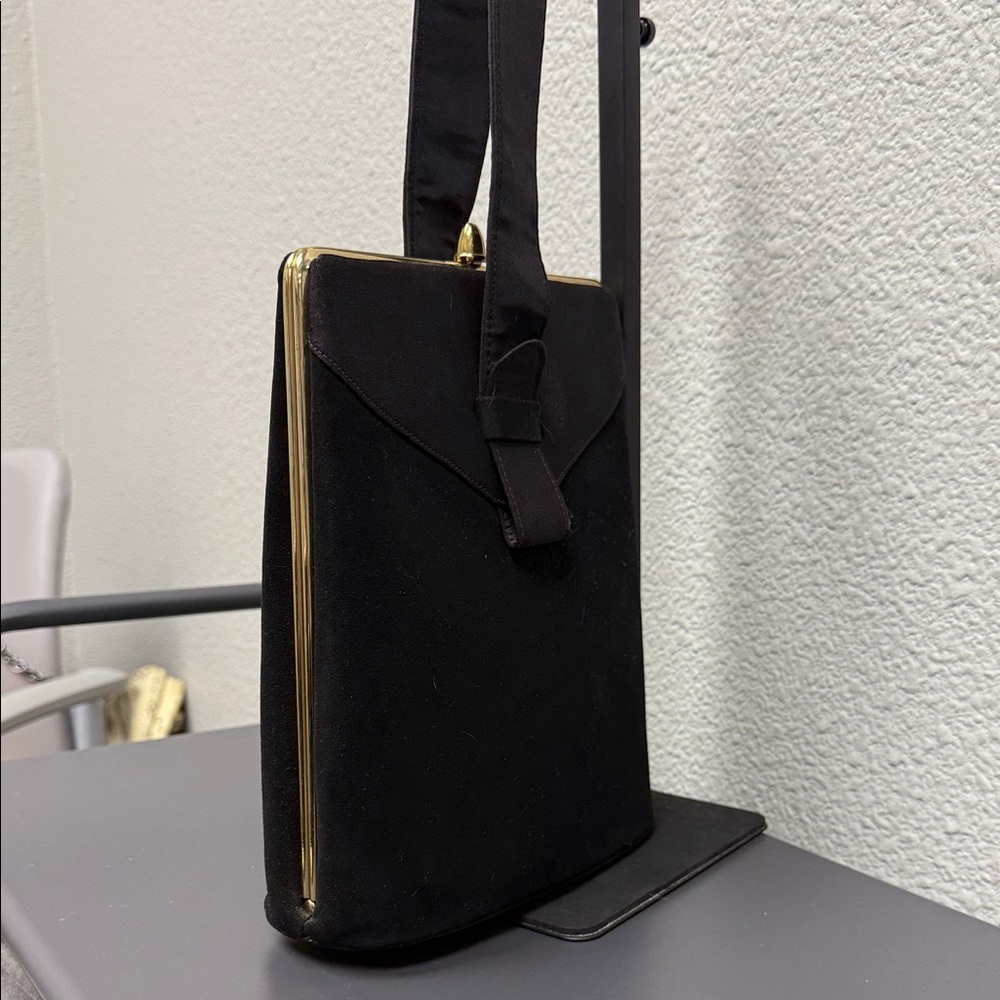 Chic Black Velvet Handbag with Gold Trim